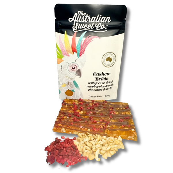 Cashew Brittle with freeze-dried raspberries and a drizzle of creamy m